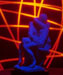Statue of Rodin's sculpture 'The Kiss' lit with red LEDs in back and spotlit by blue LED 
from front. Approx 20 second shutter time.