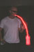 Me 'spitting' a trail of red light into a bottle (also backlit with red light). 
Approx 20 second shutter time.