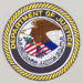 The Department of Justice seal.